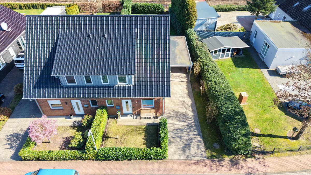 Immobilienangebot - Edewecht - Alle - Moderne Doppelhaushälfte in Edewecht-Süddorf mit durchdachtem Grundriss und Carport
