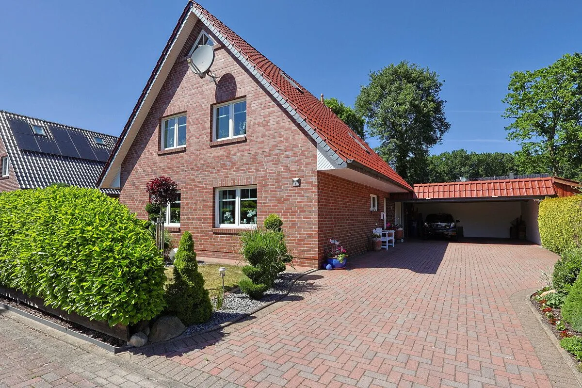 Immobilienangebot - Wiefelstede - Alle - Familienfreundliches Einfamilienhaus mit schönem Garten und Doppelcarport in Metjendorf