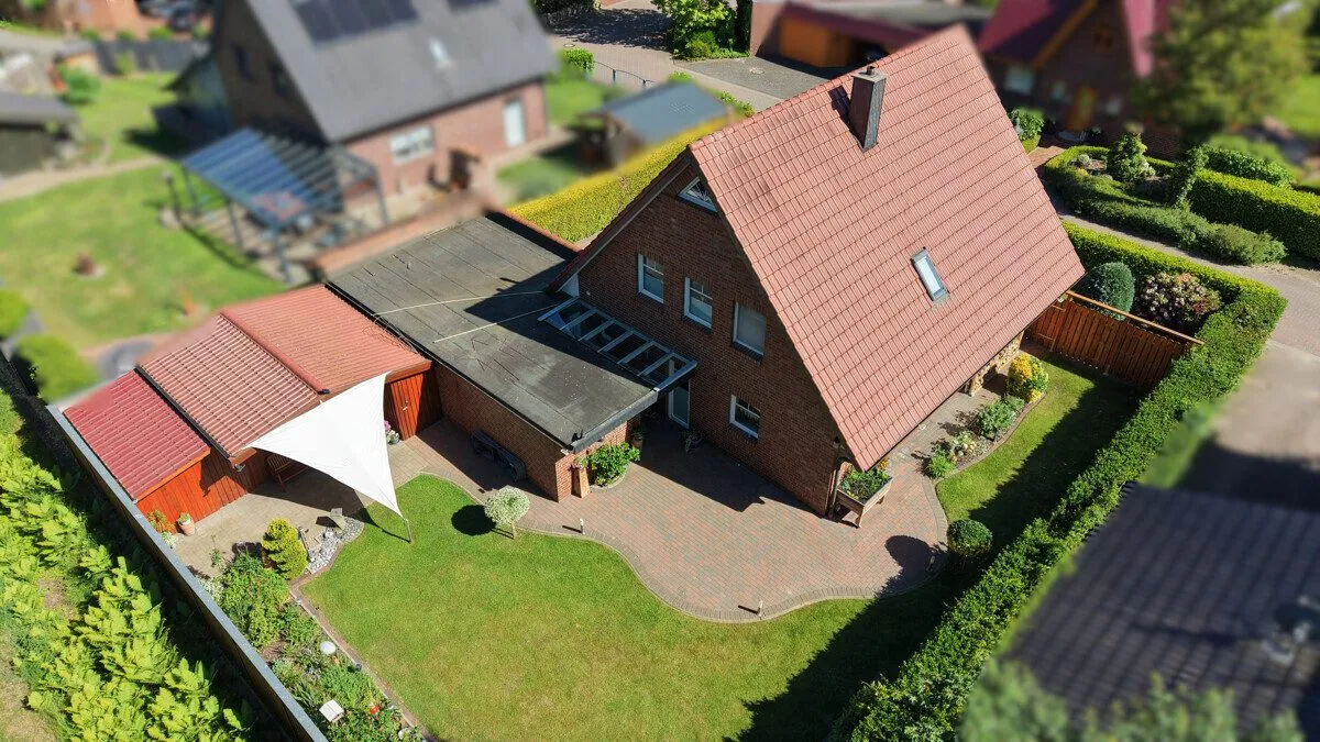 Immobilienangebot - Wiefelstede - Alle - Familienfreundliches Einfamilienhaus mit schönem Garten und Doppelcarport in Metjendorf