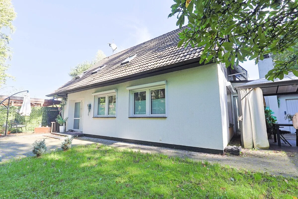 Immobilienangebot - Hatten - Alle - Wohnen am Waldrand in ruhiger Lage – großzügiges Wohnhaus mit Wintergarten