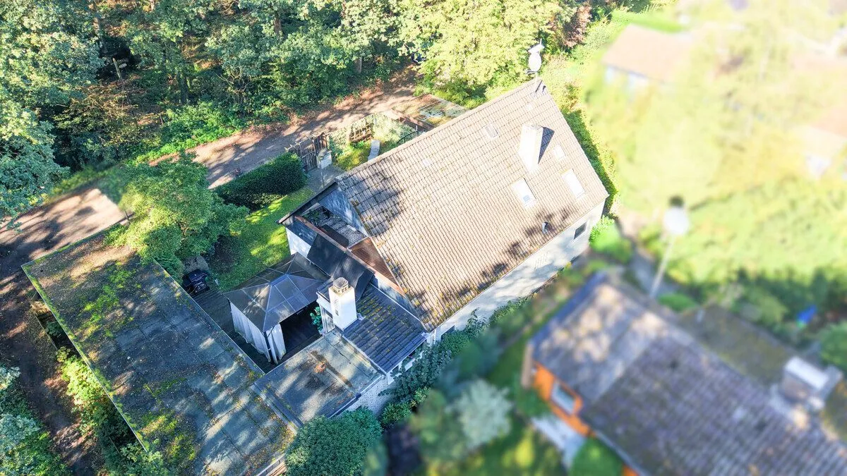 Immobilienangebot - Hatten - Alle - Wohnen am Waldrand in ruhiger Lage – großzügiges Wohnhaus mit Wintergarten